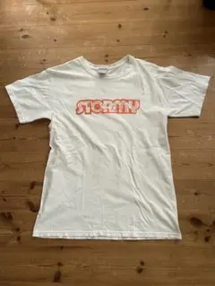 STORMY オレンジプリント Tシャツ