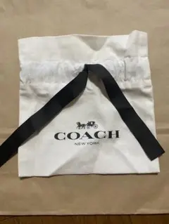 COACH ロゴ入り巾着袋