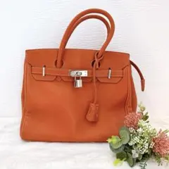 美品❤ハンドバッグ レザー 本革 オレンジ 大容量 底鋲付き シボ革