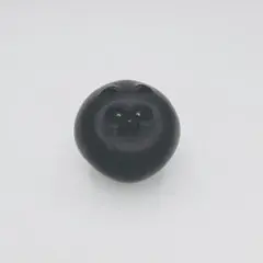 黒い顔デザインの置物
