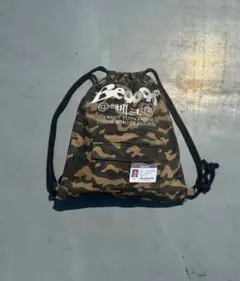 Beck × 9090 Camo Knapsack