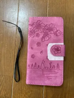 AQUOS sense7用の桜柄の手帳型スマートフォンケースです。﻿