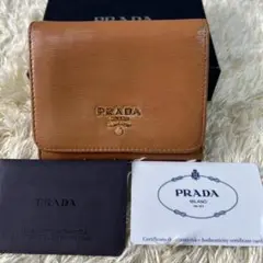 プラダ 二つ折り財布 ベージュ レザー ゴールド金具 コンパクト