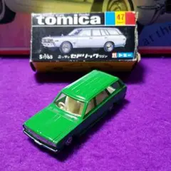 香港tomica】／230型日産セドリック4ドアセダンゴールドメタ／黒