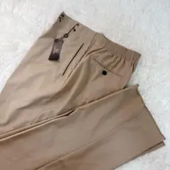 新品✨ガルニエ　ストレッチ　スラックス　カシメホック　イージーパンツ　ベージュ