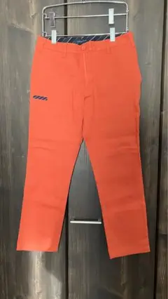 トミーヒルフィガーゴルフ　オレンジ　パンツ