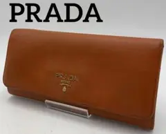 PRADA プラダ 長財布 wボタン 裏ファスナー レザー オレンジ オシャレ