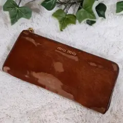 MIUMIU ミュウミュウ 長財布 カウ柄 牛 ジップ