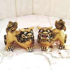 金色と黒色のシーサー像 置物