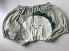 恐竜デザインの薄緑色パンツ
