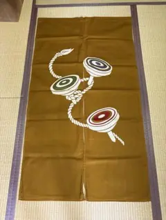 茶色のれん こまデザイン