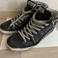 GOLDEN GOOSE Black leather metal studded