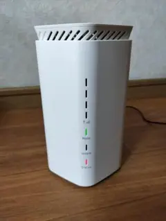 Speed Wi-Fi HOME 5G L12 NAR02 本体と電源アダプタ