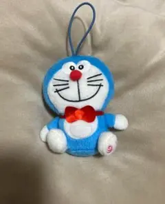 ドラえもん ぬいぐるみ 小型 赤いリボン付き