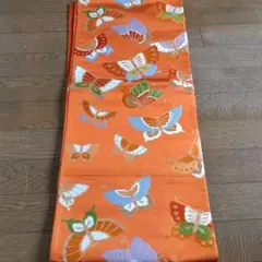 オレンジ帯　蝶々柄