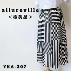 【極美品】アルアバイル ひざ丈スカート 白黒 上品 ツルツル素材 幾何学模様