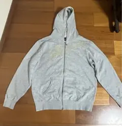 Champion XOJASPO グレー パーカー