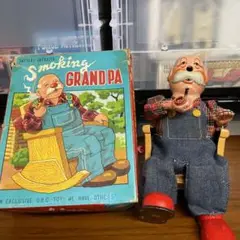 大幅値下げしました。マルサン　ブリキ　smoking grandpa 日本製 マルサン スモーキンググランパ スモーキングおじさん ブリキの