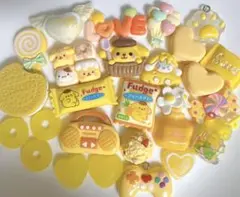 黄色 ポムポムプリン スイーツ ロリポップ デコパーツ アソート