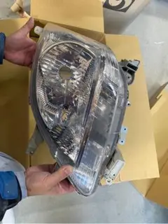 ダイハツ ムーブ ヘッドライト左