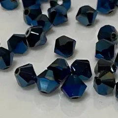 スワロフスキー5301 4ミリ　メタリックブルー２X