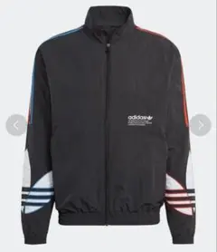 アディダス 銀アディカラー トリコロールメタリック ナイロンジャケット 女性M adidas（アディダス）の「アディカラー トリコロール メタリック