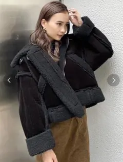 エモダ ショートフェイクムートンブルゾン