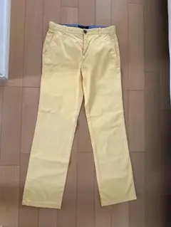 トミーヒルフィガー イエロー カスタムフィットパンツ