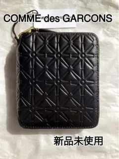 【新品未使用】【COMME des GARCONS】二つ折財布 エンボス加工