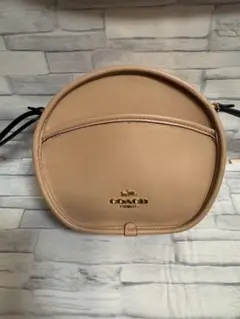 COACH ベージュ ラウンドポーチ ショルダーバック