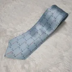 極美品☆顔文字 青色 オシャレ ネクタイ シルク 総柄