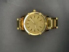 ゴールドカラーのNIXON「THE CAMDEN」腕時計