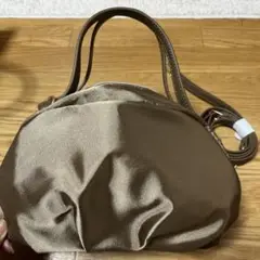 しまむらtal.byyumi濃いベージュ丸型ショルダーバッグ