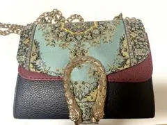 セヴィンチエイト　イスラム柄ショルダーバッグ 蛇の頭金具付き