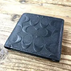 COACH 二つ折り財布 エンボス加工