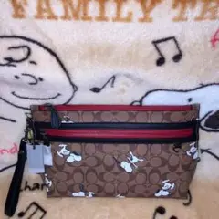 新品未使用 COACH スヌーピー シグネチャー クラッチ