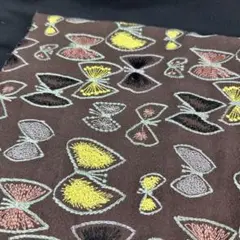 刺繍生地.中厚リネン.幅135cm×50cm.茶色地.蝶々