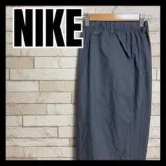 NIKE ナイロンパンツ ズボン シャカシャカ オシャレ グレー シルバー 古着