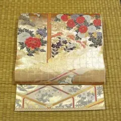 ゴールドに菱形と花々 袋帯