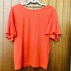 オレンジ色　カットソー