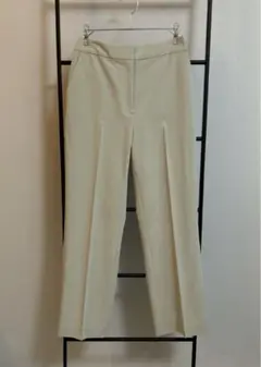 ナチュラルビューティーベーシック センタープレスパンツ XS ライトグレー