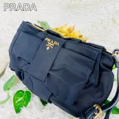 ✨美品✨プラダ ポーチ リボン ゴールドロゴ金具 ナイロンサフィアーノ 白タグ