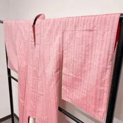 薄いピンク色に縦縞柄の紬の小紋 着物