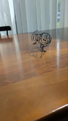 スサーしてる文鳥のワイヤーアート