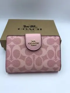 新品・未使用COACH 二つ折り財布 ピンクCOACH桃色