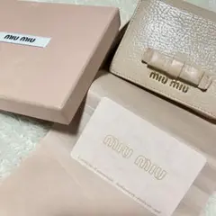 格安ミュウミュウ 二つ折り財布 コンパクトウォレット リボン マドラス シボ革
