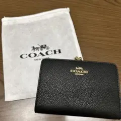 新品　COACH コーチ　二つ折り財布　ブラック　がま口　キスロック