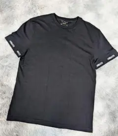 Axel Arigato アクセルアリガトロゴTシャツ