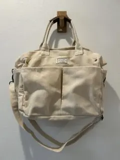 キャンバス製ショルダーバッグ クリーム色