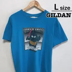 USA古着　GILDAN　Tシャツ　L　ライトブルー　水色　キャラクター　ロゴ